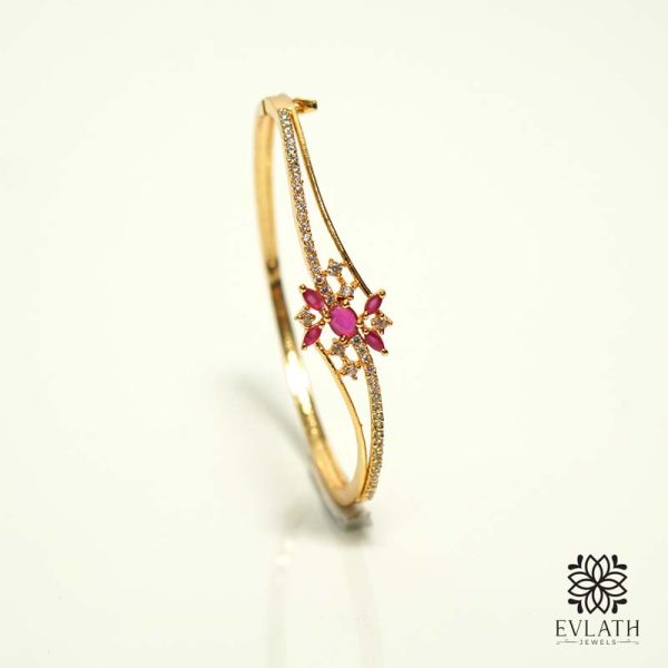 Premium gold-plated AD and ruby stone-studded adjustable bangles - Evlath Jewels.