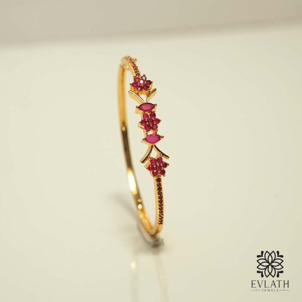 Premium Gold-Plated Bangles with Ruby Stone Detailing, Adjustable Fit - Evlath Jewels.