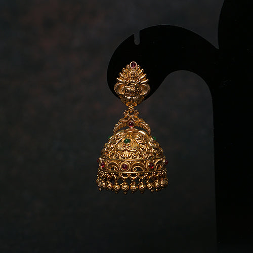 Antique gold jhumkas with multi-color stones & Lakshmi temple design – Evlath Jewels.