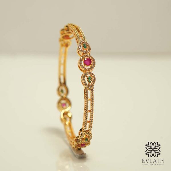 Elegant Gold-Plated Bangle Set with Green Ruby Accents – Evlath Jewels