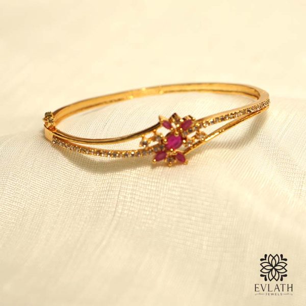 Premium gold-plated AD and ruby stone-studded adjustable bangles - Evlath Jewels.