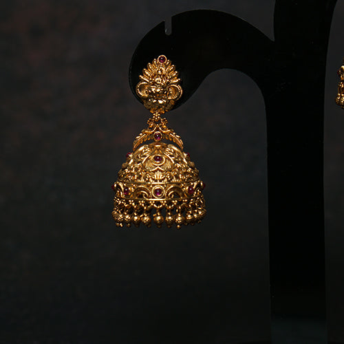 Antique gold jhumkas with ruby stones & Lakshmi temple design – Evlath Jewels.