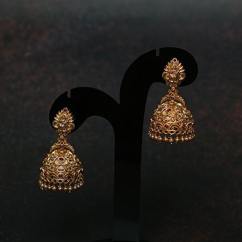 Antique gold jhumkas with ruby stones & Lakshmi temple design – Evlath Jewels.