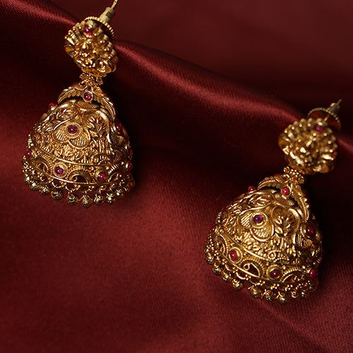 Antique gold jhumkas with ruby stones & Lakshmi temple design – Evlath Jewels.