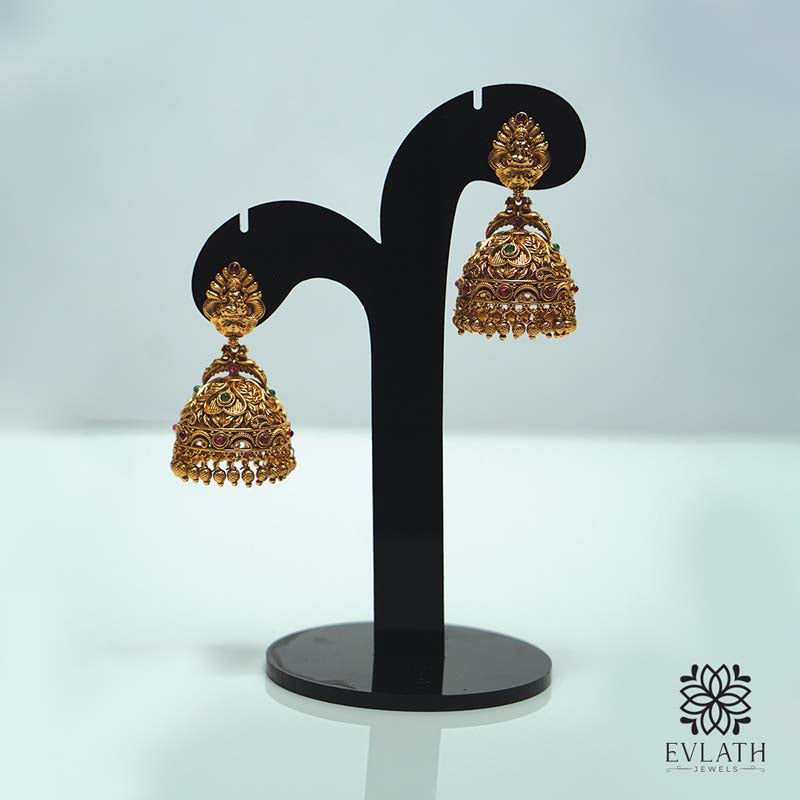 Antique gold jhumkas with multi-color stones & Lakshmi temple design – Evlath Jewels.