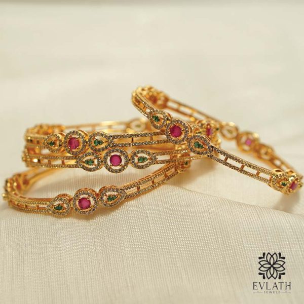 Elegant Gold-Plated Bangle Set with Green Ruby Accents – Evlath Jewels