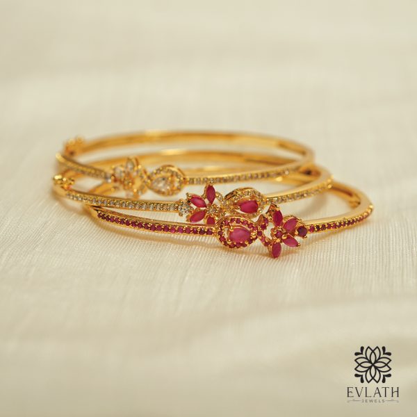 Premium gold-plated AD and ruby stone-studded op-enable bangles - Evlath Jewels.