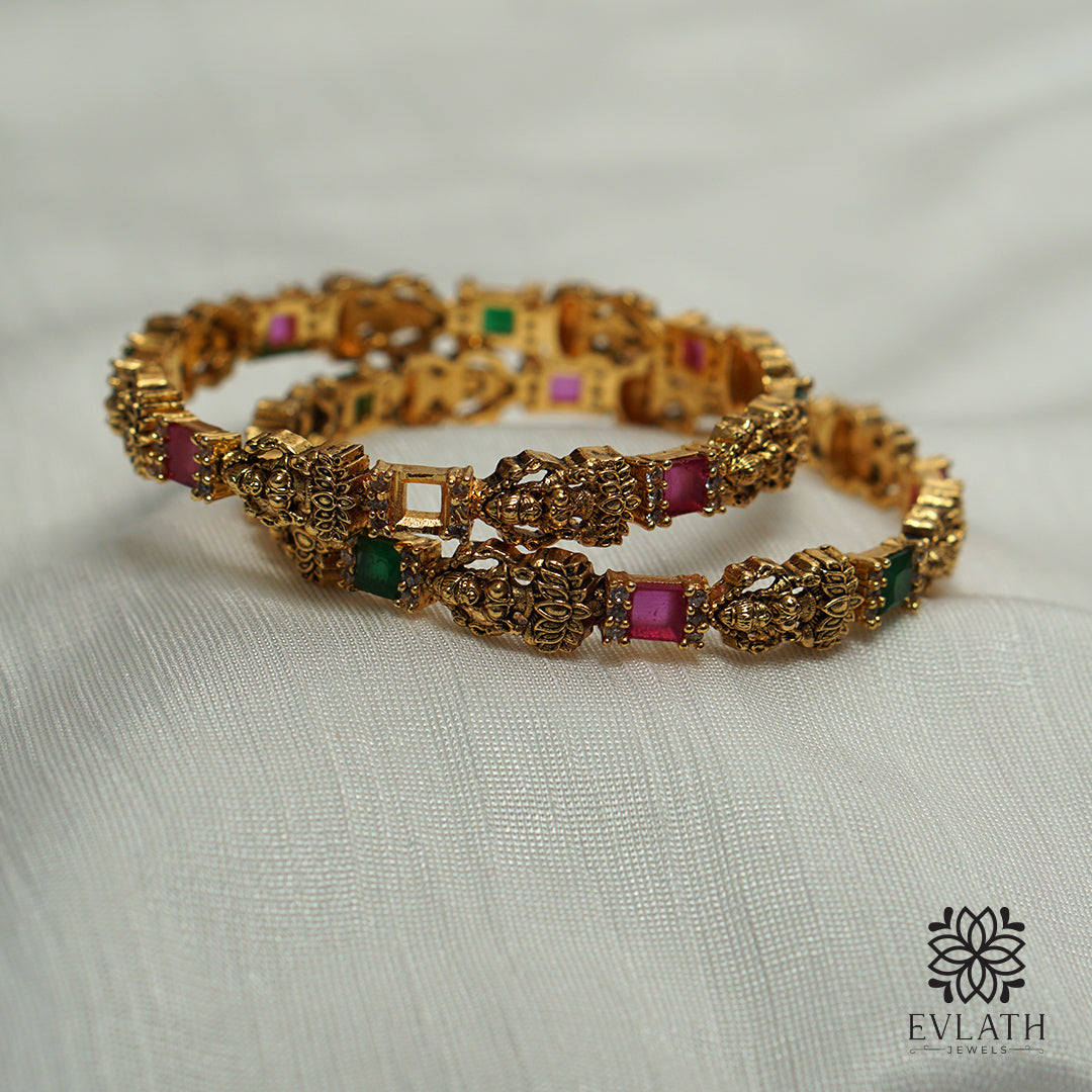 Timeless Antique Lakshmi Bangles with Ruby & Emerald Elegance - Evlath Jewels