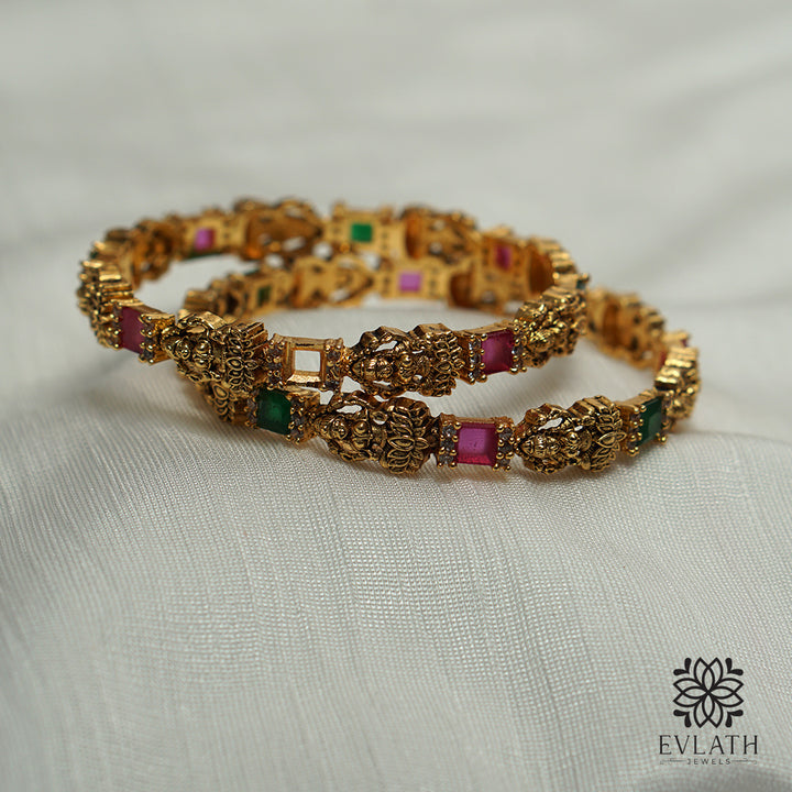 Timeless Antique Lakshmi Bangles with Ruby & Emerald Elegance - Evlath Jewels